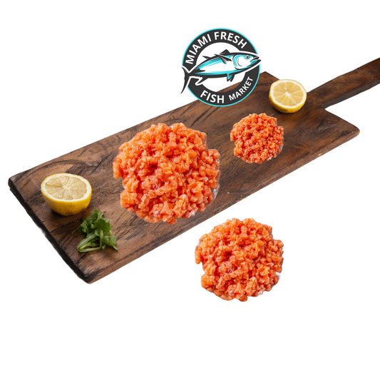 Ground-wild-Salmon-Fresh-fish-Frozen-on-brown-wood-plate-miami-fresh-fish-market