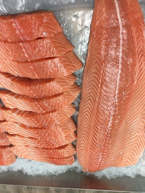 display-of-slab-wild-king-salmon-and-slice-salmon 