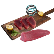 Fillet-steak_slice_yellow_Fin_tuna-and-big-tuna part-tuna-on-Brwon_wood_plate-miami-fresh-fish-market