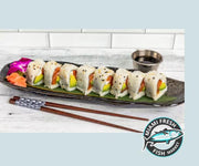 #1-Salmon-Avocado-Sushi-Roll-Chopsticks-on-glass-plate-side-sauce-order-online-deliver