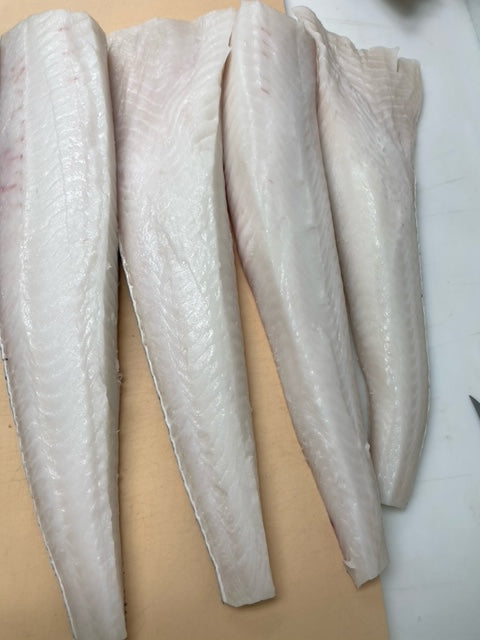 multi-long-white-slices-of-sea-bass-fillet-miami-fresh-fish-market